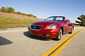 AUT 29 RK1012 01
2006 Lexus SC430 Convertible Red 3/4 Front View On Road In Motion