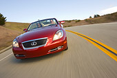AUT 29 RK1013 01
2006 Lexus SC430 Convertible Red Slanted Head On View On Road In Motion