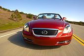 AUT 29 RK1014 01
2006 Lexus SC430 Convertible Red Head On View On Road In Motion