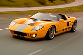 AUT 29 RK1101 01
2006 Ford GTX1 Yellow And Silver 3/4 Front View On Road In Motion