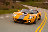 AUT 29 RK1103 01
2006 Ford GTX1 Yellow And Silver 3/4 Front View On Road In Motion