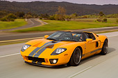 AUT 29 RK1104 01
2006 Ford GTX1 Yellow And Silver 3/4 Front View On Road In Motion