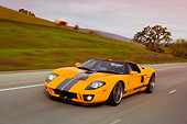 AUT 29 RK1105 01
2006 Ford GTX1 Yellow And Silver 3/4 Front View On Road In Motion