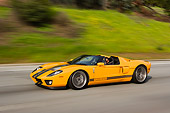 AUT 29 RK1106 01
2006 Ford GTX1 Yellow And Silver 3/4 Side View On Road In Motion