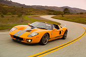 AUT 29 RK1107 01
2006 Ford GTX1 Yellow And Silver 3/4 Front View On Road In Motion