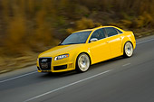 AUT 29 RK1204 01
2007 Audi RS4 Yellow 3/4 Side View On Road In Motion
