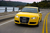 AUT 29 RK1227 01
2007 Audi RS4 Yellow 3/4 Front View On Road In Motion