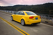 AUT 29 RK1234 01
2007 Audi RS4 Yellow 3/4 Rear View On Road In Motion