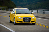 AUT 29 RK1240 01
2007 Audi RS4 Yellow 3/4 Front View On Road In Motion