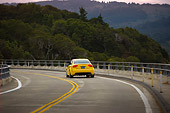 AUT 29 RK1243 01
2007 Audi RS4 Yellow Rear View On Road In Motion