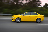 AUT 29 RK1247 01
2007 Audi RS4 Yellow Profile View On Road In Motion