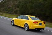 AUT 29 RK1248 01
2007 Audi RS4 Yellow 3/4 Rear View On Road In Motion