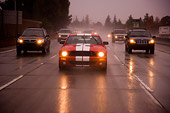 AUT 29 RK1250 01
2007 Ford Shelby Mustang GT500 Coupe Red And White Head On View On Road In Motion