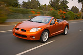 AUT 29 RK1275 01
2007 Mitsubishi Eclipse Spyder GT Orange 3/4 Front  View On Road In Motion