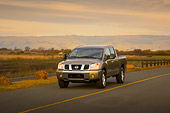 AUT 29 RK1277 01
2007 Nissan Titan 4x4 SE Gray 3/4 Front View On Road In Motion