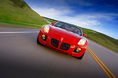 AUT 29 RK1284 02
2007 Pontiac Solstice GXP Convertible Red Slanted Head On View On Road In Motion