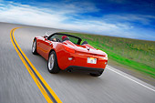 AUT 29 RK1289 01
2007 Pontiac Solstice GXP Convertible Red 3/4 Rear View On Road In Motion
