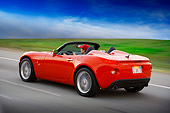 AUT 29 RK1295 01
2007 Pontiac Solstice GXP Convertible Red 3/4 Rear View On Road In Motion