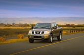 AUT 29 RK1314 01
2007 Nissan Titan 4x4 SE Gray 3/4 Front View On Road In Motion