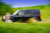 AUT 29 RK1317 01
2007 Land Rover LR3 Blue Profile View On Grass Hill In Motion