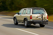 AUT 29 RK1324 01
2004 Nissan Pathfinder Gold 3/4 Rear View On Road In Motion