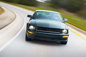 AUT 29 RK1446 01
2008 Ford Mustang Bullitt Green Head On View Driving On Highway