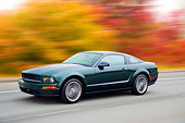 AUT 29 RK1448 01
2008 Ford Mustang Bullitt Green 3/4 Front View Driving On Highway