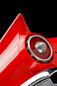AUT 30 BK0187 01
1957 Ford Thunderbird Red With White Top Tail Light Detail In Studio