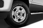 AUT 30 IZ1259 01
2013 Ford F-250 SD Crew Cab 4X4 Pickup Truck Silver Front Wheel Detail In Studio