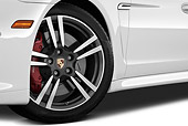 AUT 30 IZ1272 01
2013 Porsche Panamera Turbo White Front Wheel Detail In Studio