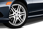 AUT 30 IZ1296 01
2011 Mercedes-Benz E350 4Matic Wagon Blue Front Wheel Detail On White Seamless
