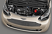 AUT 30 IZ1542 01
2013 Aston Martin Cygnet Micro Car Tan Engine Detail In Studio