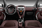 AUT 30 IZ1544 01
2013 Aston Martin Cygnet Micro Car Tan Interior Detail In Studio