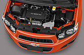 AUT 30 IZ1718 01
2013 Chevrolet Sonic LT 5-Door Hatchback Orange Engine Detail In Studio