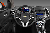 AUT 30 IZ1748 01
2013 Chevrolet Sonic LT 5-Door Hatchback Orange Interior Detail In Studio