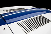 AUT 30 RK5265 01
1963 Jaguar Lightweight E-Type 5114 WK White With Blue Stripes Vent Detail In Studio