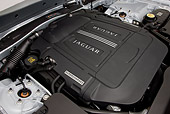 AUT 30 RK5531 01
2011 Jaguar XKR Coupe Silver Engine Detail In Studio
