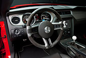 AUT 30 RK5636 01
2011 Shelby Ford Mustang GT500 SVT Red With White Stripes Interior Detail In Studio