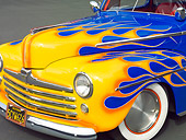 AUT 30 RK5706 01
1948 Ford 2-Door Sedan Blue With Yellow Flames Front Detail On Pavement