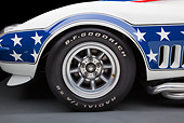 AUT 30 RK5722 01
1969 Chevrolet Corvette BFG #49 ZL-1 Race Car Red, White And Blue Front Wheel Detail In Studio