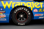 AUT 30 RK5987 01
1987 Chevrolet Monte Carlo Stock Car Blue And Yellow Rear Tire Detail In Studio