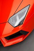 AUT 30 RK6096 01
2012 Lamborghini Aventador Tangerine Headlight Detail In Studio