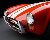 AUT 30 RK6230 01
1966 Shelby AC Cobra Red With White Stripes Front Detail In Studio