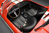 AUT 30 RK6233 01
1966 Shelby AC Cobra Red With White Stripes Interior Detail In Studio