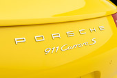 AUT 30 RK6283 01
2013 Porsche 911 Carrera S Cabriolet Yellow Logo Detail In Studio