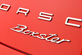 AUT 30 RK6286 01
2013 Porsche Boxster Red Logo Detail In Studio