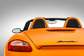 AUT 30 IZ0048 01
2010 Porsche Limited Edition Boxster Orange Rear Detail Studio