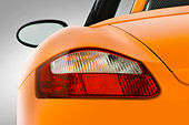 AUT 30 IZ0049 01
2010 Porsche Limited Edition Boxster Orange Brake Light Detail Studio