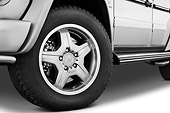 AUT 30 IZ0352 01
2010 Mercedes-Benz G55 AMG Silver Front Wheel Detail Studio