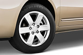 AUT 30 IZ0370 01
2009 Kia Rondo LX Champagne Front Wheel Detail Studio
